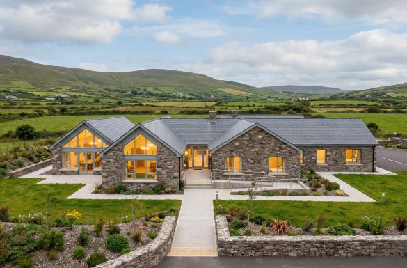 Montbretia House at dusk, with the hills of West Kerry behind